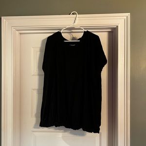 Black short sleeve shirt with band at waist from Torrid